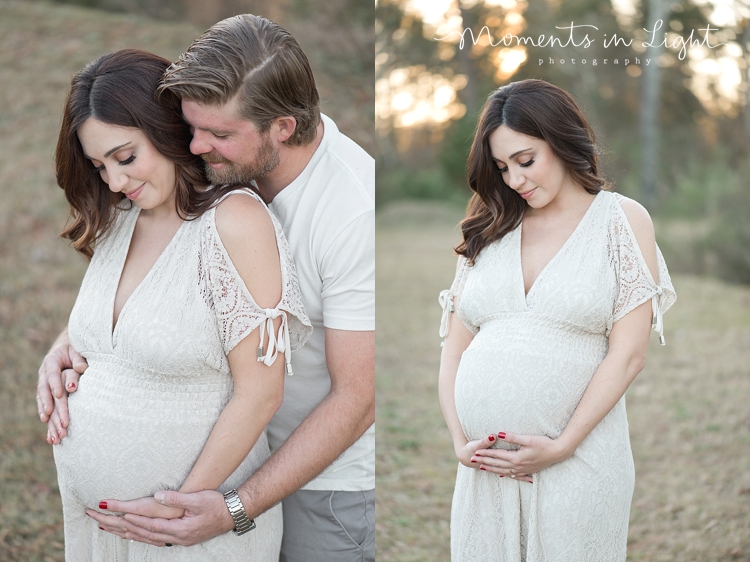 Expecting mother in white lace dress with husband in a field by Houston maternity photographer