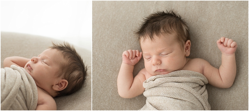 A baby with long hair sleeps during his Newborn Lifestyle Photography session. 