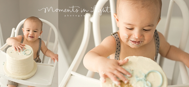 One year-old baby boy eating birthday cake by Houston baby photographer