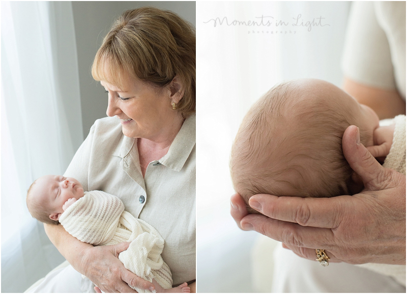 A grandma holds a new baby during a session featuring newborn photography with family in The Woodlands, Texas. 