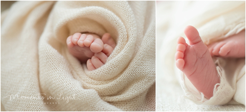 A baby's toes stretch from under a blanket during a newborn baby photography session. 