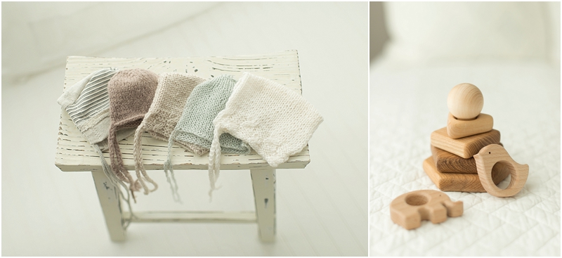 Baby hats sit on a stool in a newborn photography studio in The Woodlands, TX. 