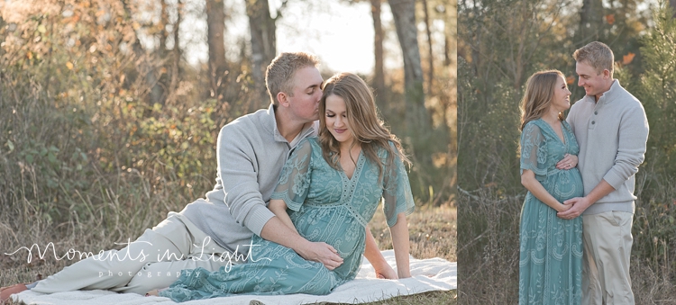 Husband and pregnant wife on a blanket in field by maternity photographer in The Woodlands