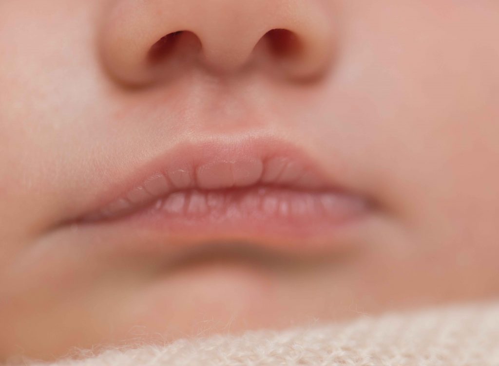 close up of newborn baby lips