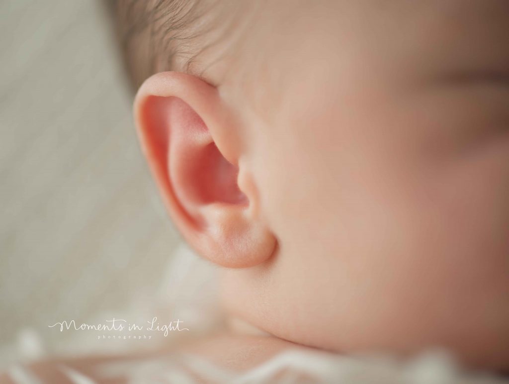 closeup of newborn baby's ear in The Woodlands, Texas