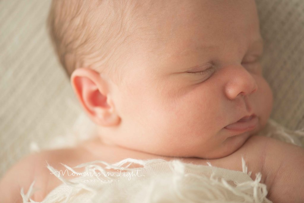 closeup of newborn baby's face in The Woodlands, Texas 