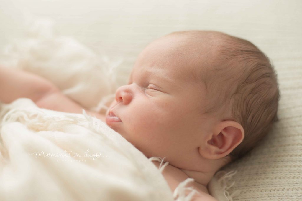 newborn baby closeup of face in The Woodlands, TX