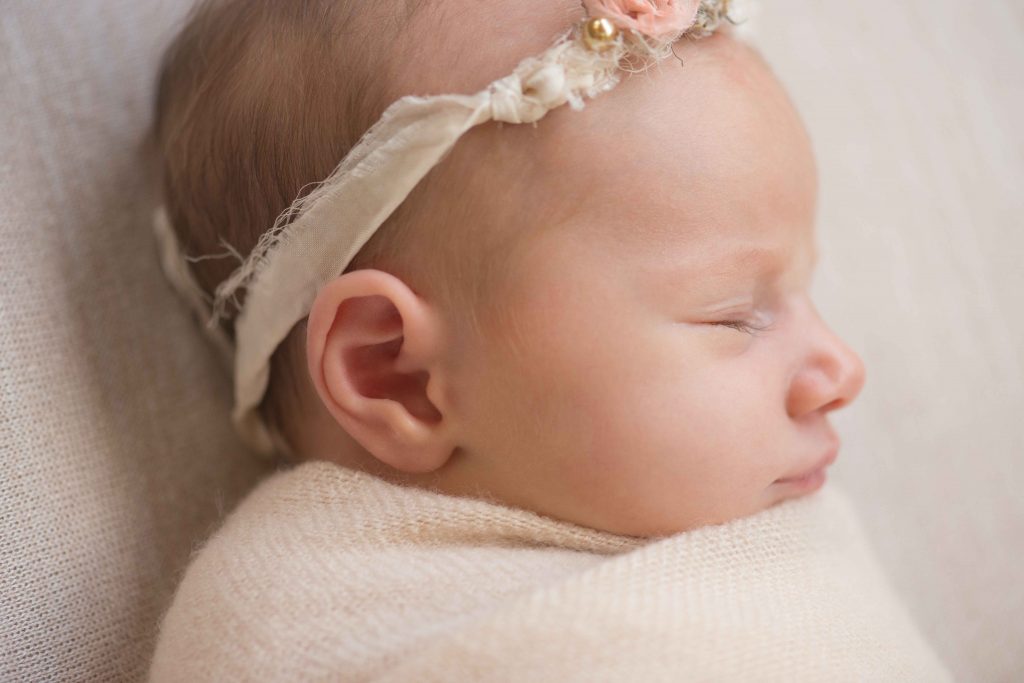 close up of newborn baby profile 