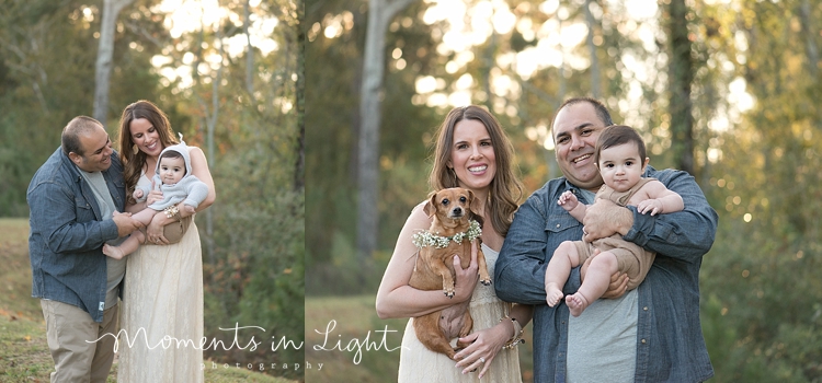 Mother, father, baby boy and dog in a field by family photographer in Montgomery, Texas