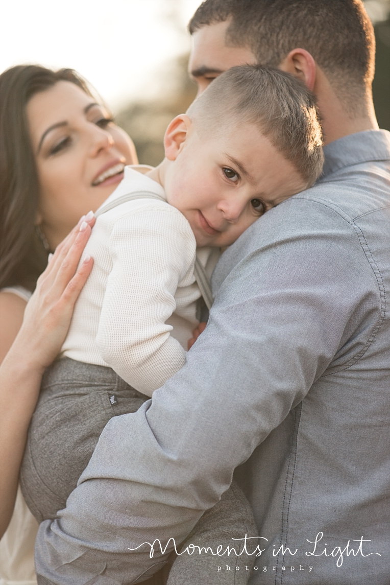 A daddy holds his son | Natural Light Photography In Houston | Moments In Life Photography