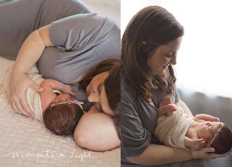 Mother lying on a bed with baby daughter by Houston newborn photographer