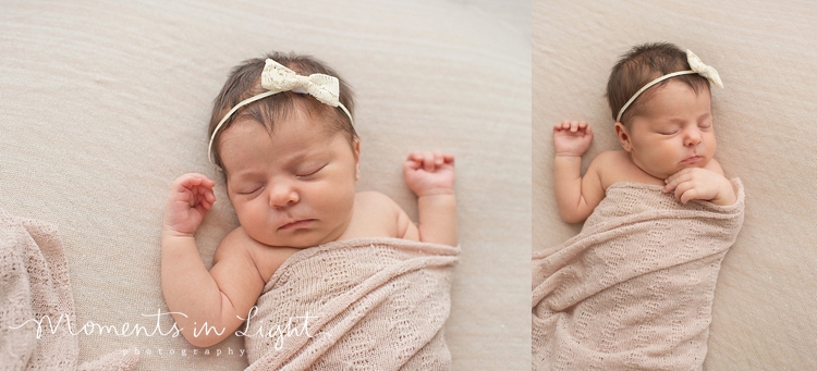 Baby girl wearing headband sleeping in a newborn photography studio in Montgomery, Texas